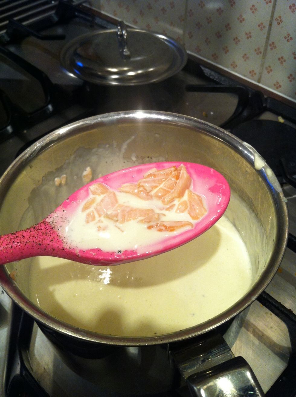 Salmon will change colour showing it is cooking well!