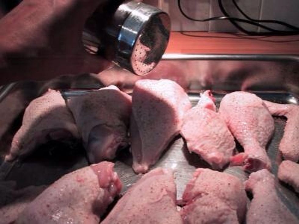 Salt and pepper the chicken