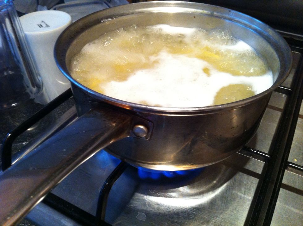 Salt water and cook fettuccine.