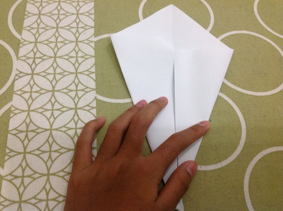 Same as the other side. You should get this kite shape.
