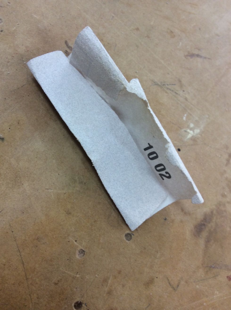 Sand again until smooth