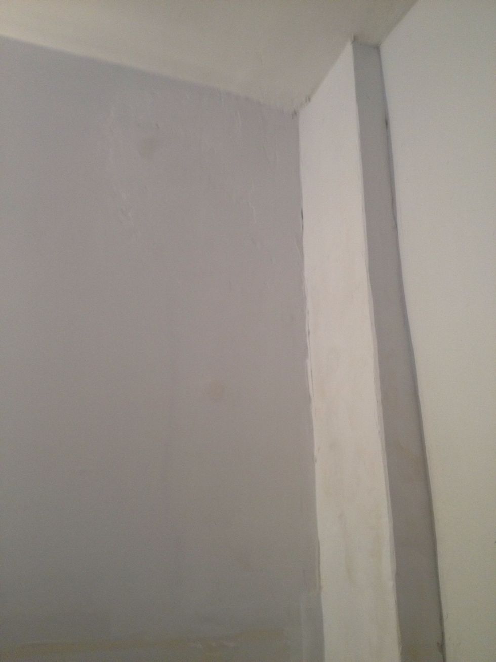 Sand off and reapply plaster until smooth