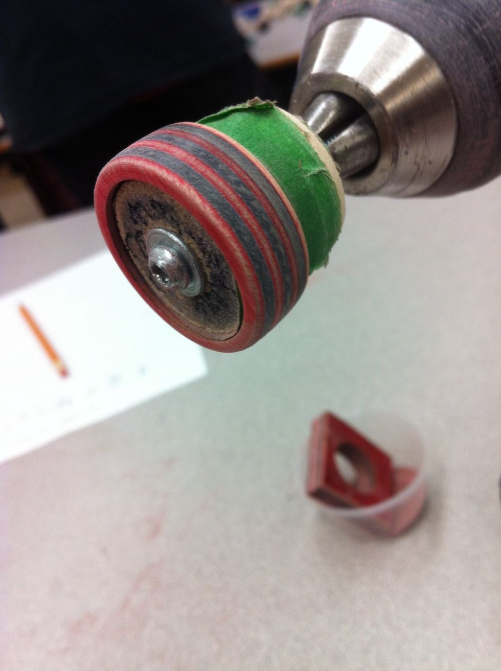 Sand with 400 grit sand paper.