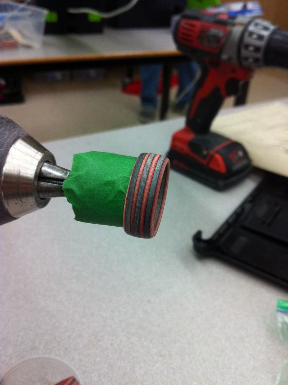 Sand with 600 grit sand paper on the in and out side of your ring in till extremely smith.