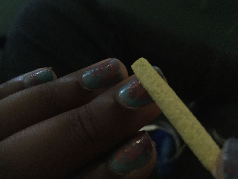 Sand your nails I can't because i have nail polish on