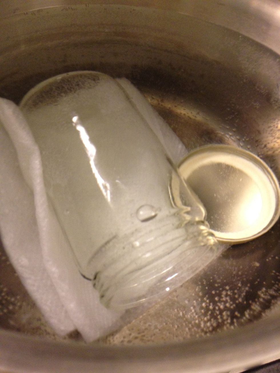 Sanitize your equipment by boiling. Use a towel on the bottom so you don't crack the jar