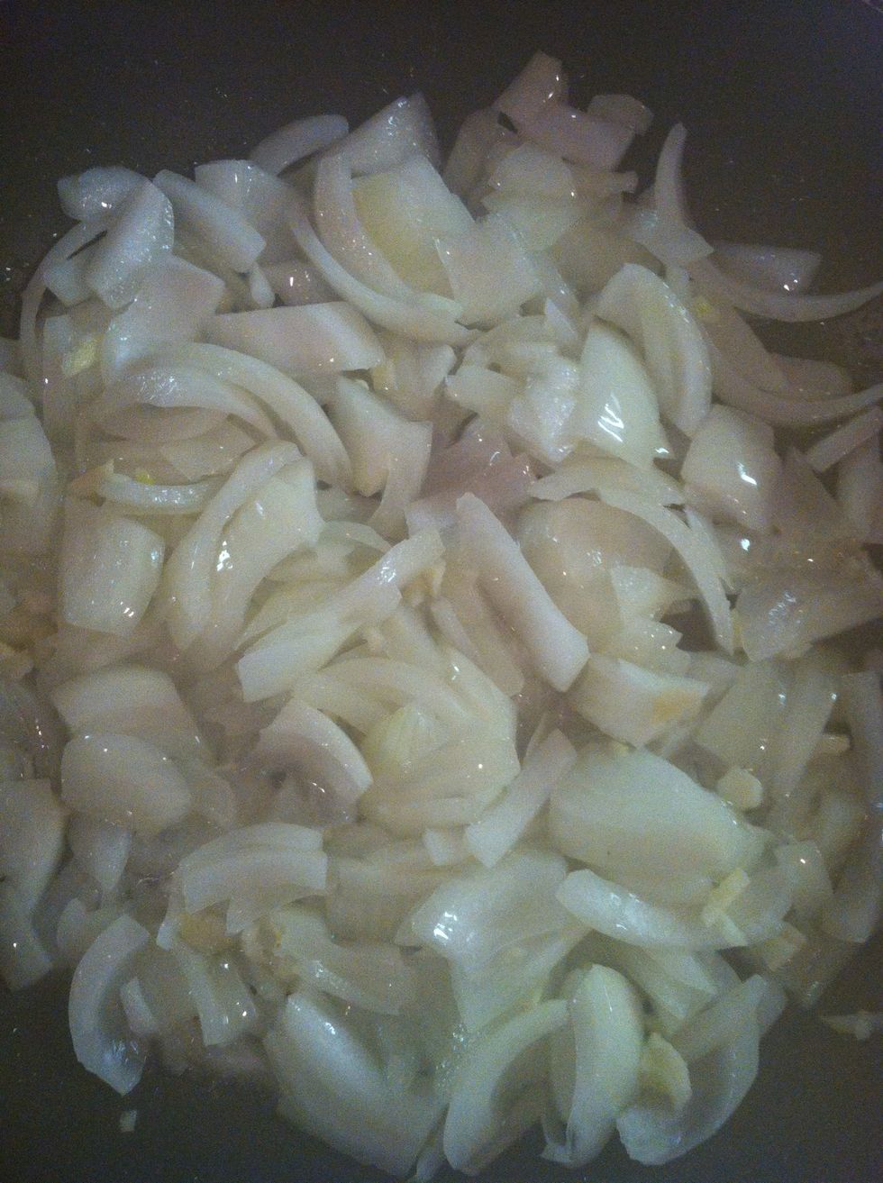 Saut\u00e9 1 large onion and 2 cloves of garlic in 3 tablespoons of grape seed oil...