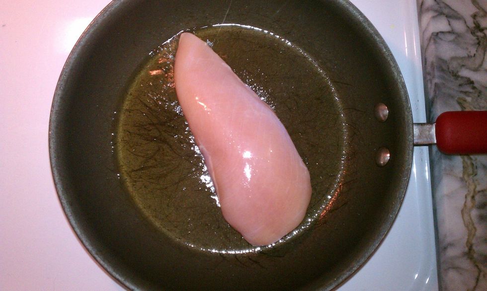 Saut\u00e9 Chicken Breast on medium heat with olive oil 5-10 min on each side