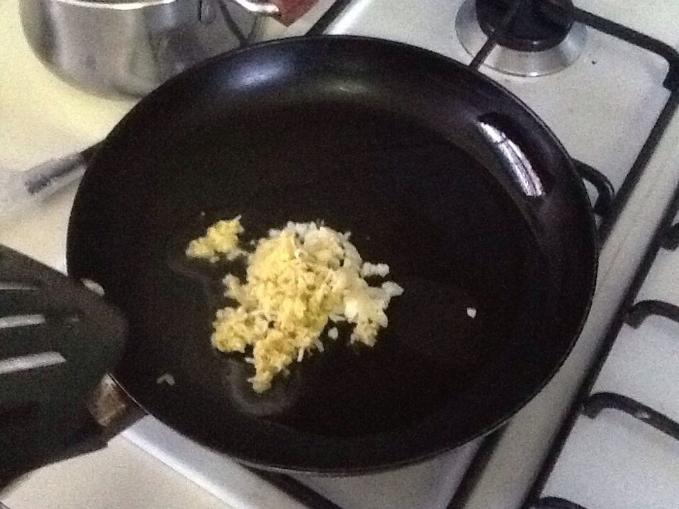 Saut\u00e9 garlic and ginger in peanut oil