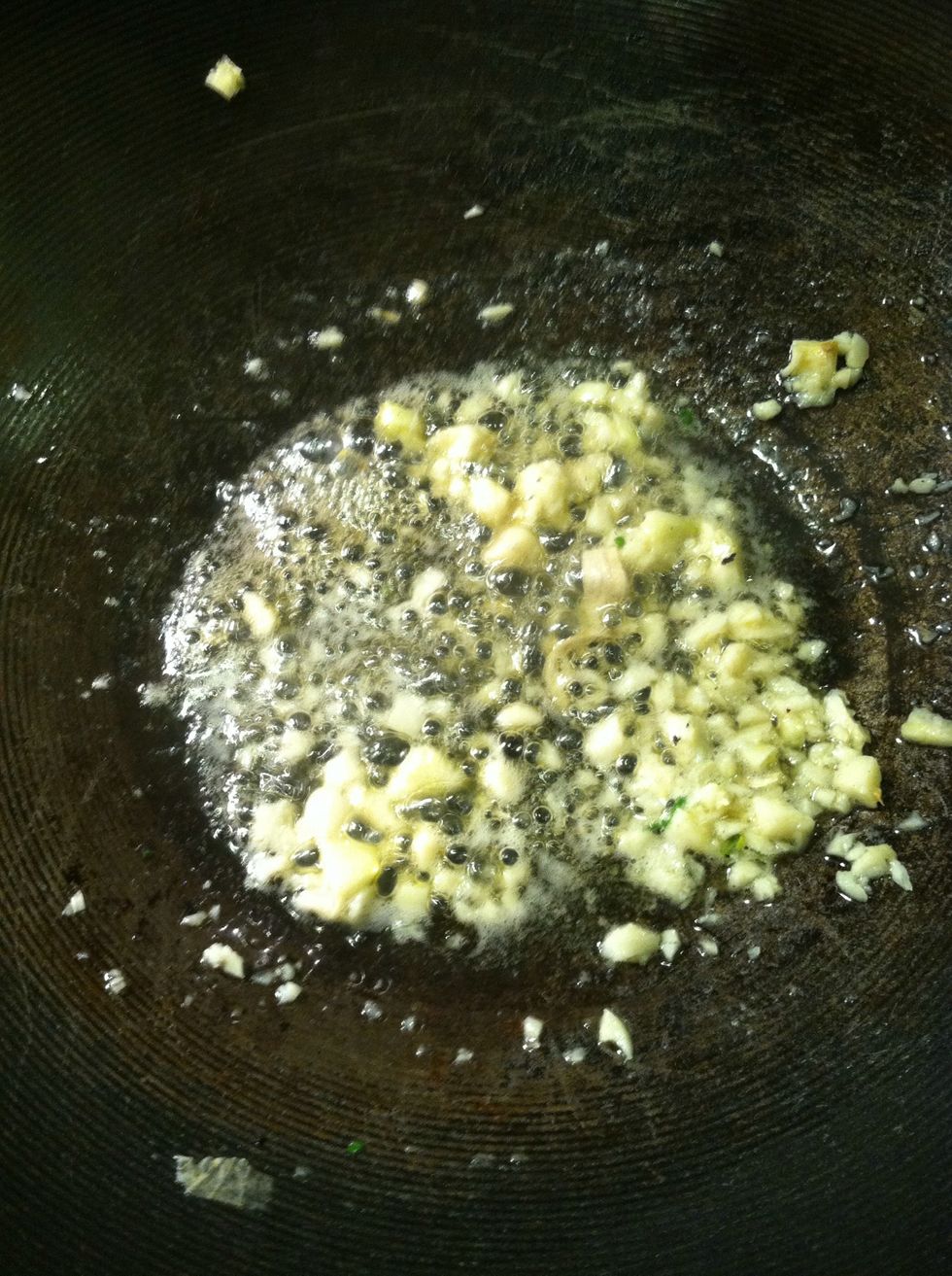 Saut\u00e9 minced garlic in butter