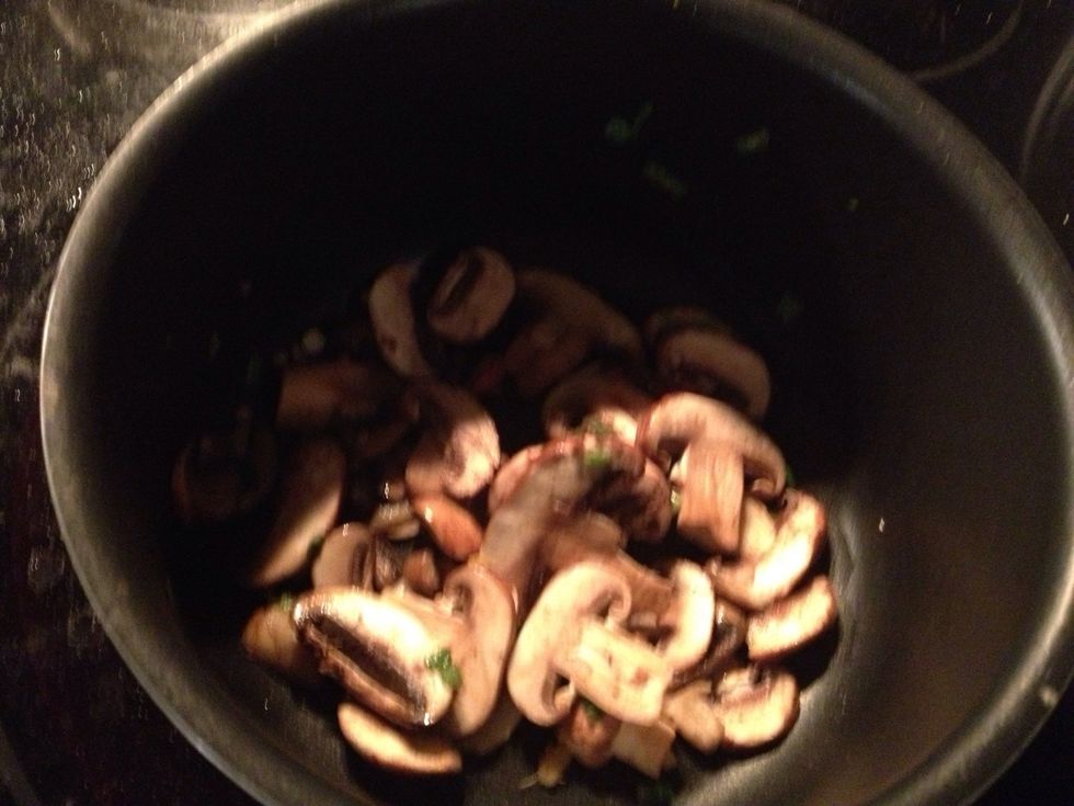 Saut\u00e9 mushrooms of choice in leftover garlic, ginger, and green onions. Use some of the juice from the cooking turkey burger to add more flavor. Place on top of burger when finished cooking