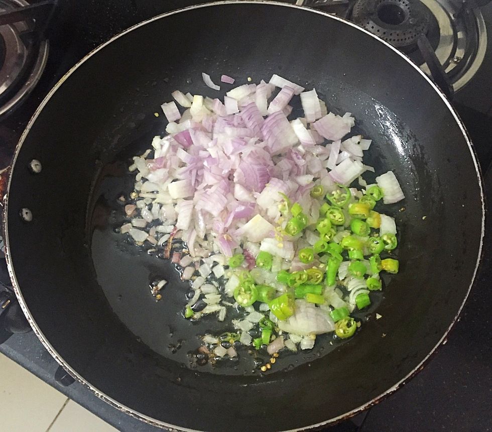Saut\u00e9 onion and green chilly for two minutes in low flame