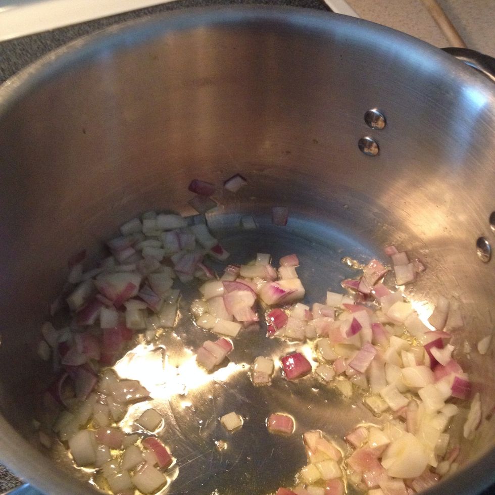 Saut\u00e9 onion in olive oil till translucent over medium heat