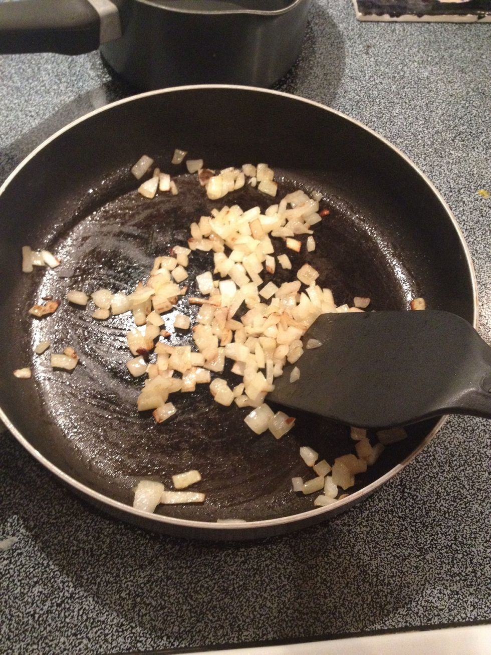 Saut\u00e9 onion until transparent and soft.