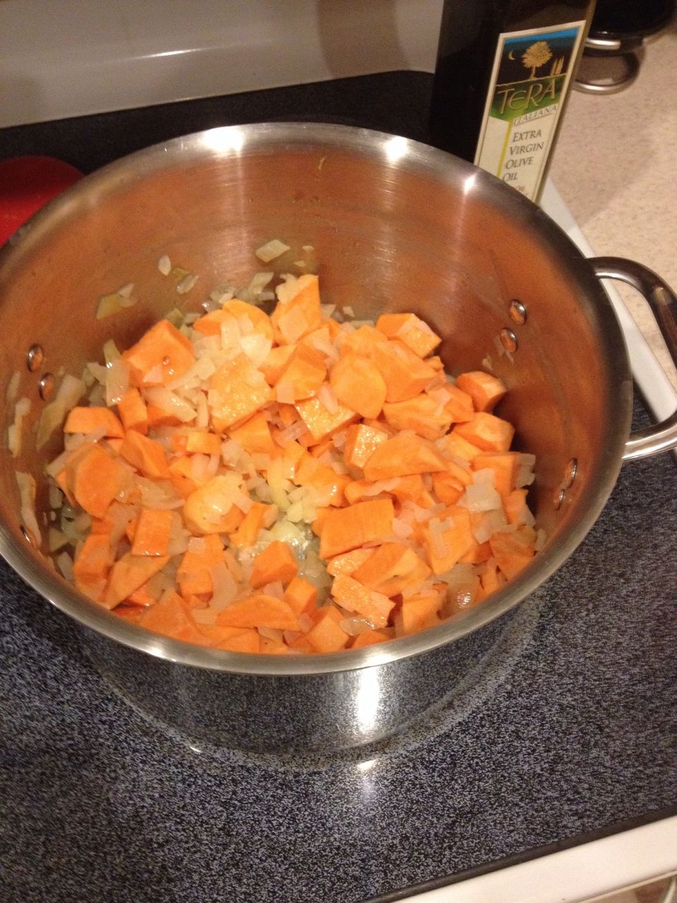 Saut\u00e9 onions over medium heat for 10 minutes then add the potatoes and saut\u00e9 for 5 more minutes.