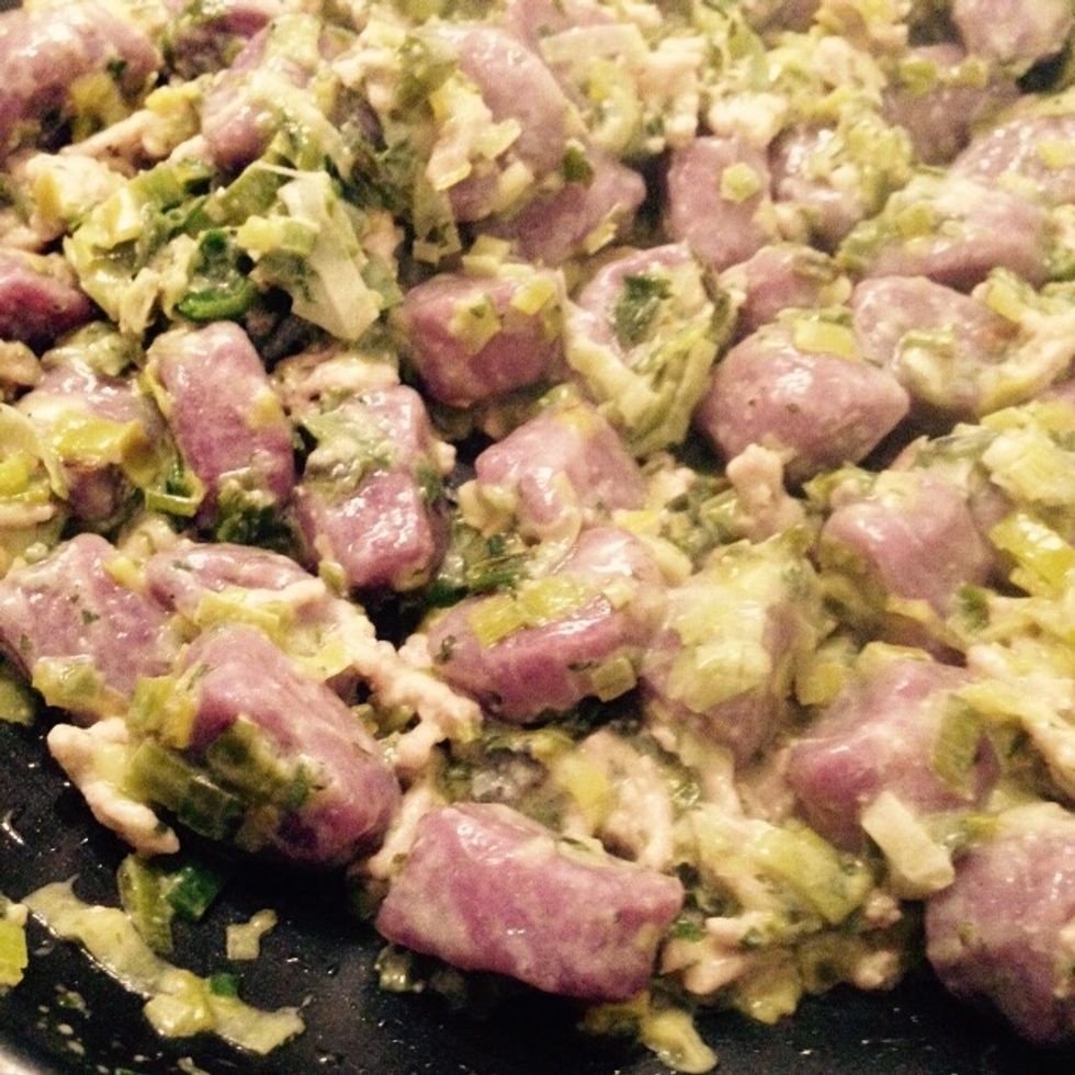 Saut\u00e9 quickly to mix everything evenly