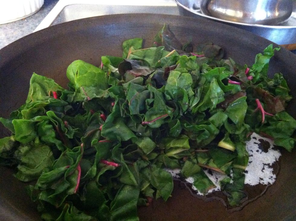 Saut\u00e9 Swiss chard chopped leafy greens with butter and garlic! When saut\u00e9ed (8min) toss into a bowl on the side-keep pan at medium heat