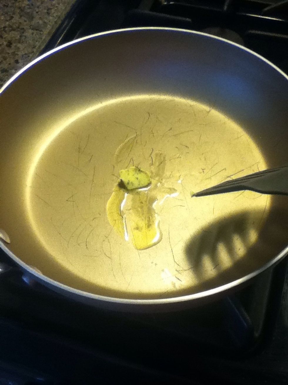 Saut\u00e9 the chopped stems and garlic with oil. I used herb butter and olive oil mix but you can use different cooking oil of your choice if you want.