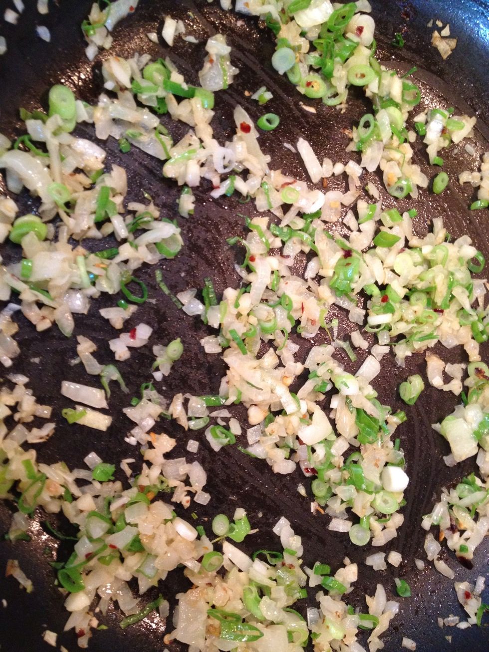 Saut\u00e9 the diced onion and green onion