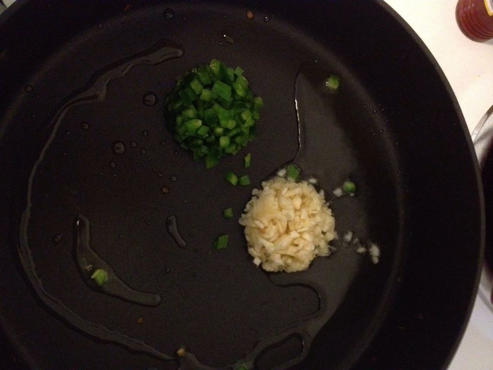 Saut\u00e9 the garlic and jalape\u00f1o.