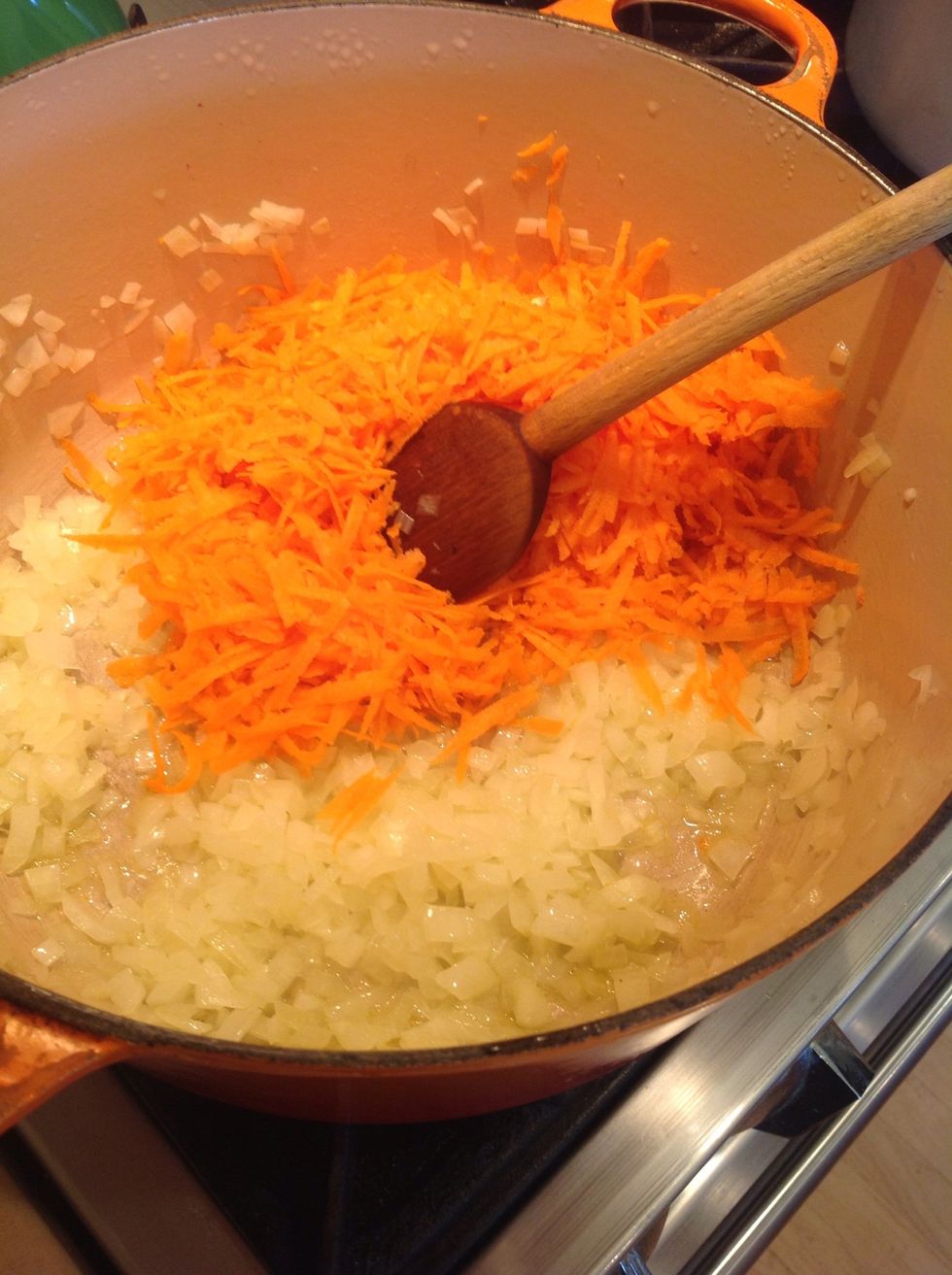 Saut\u00e9 the onion when sweated down addthe carrot
