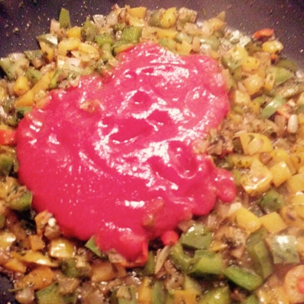 Saut\u00e9 the peppers for 5-10min, add some water as they dry. Then stir in the passata