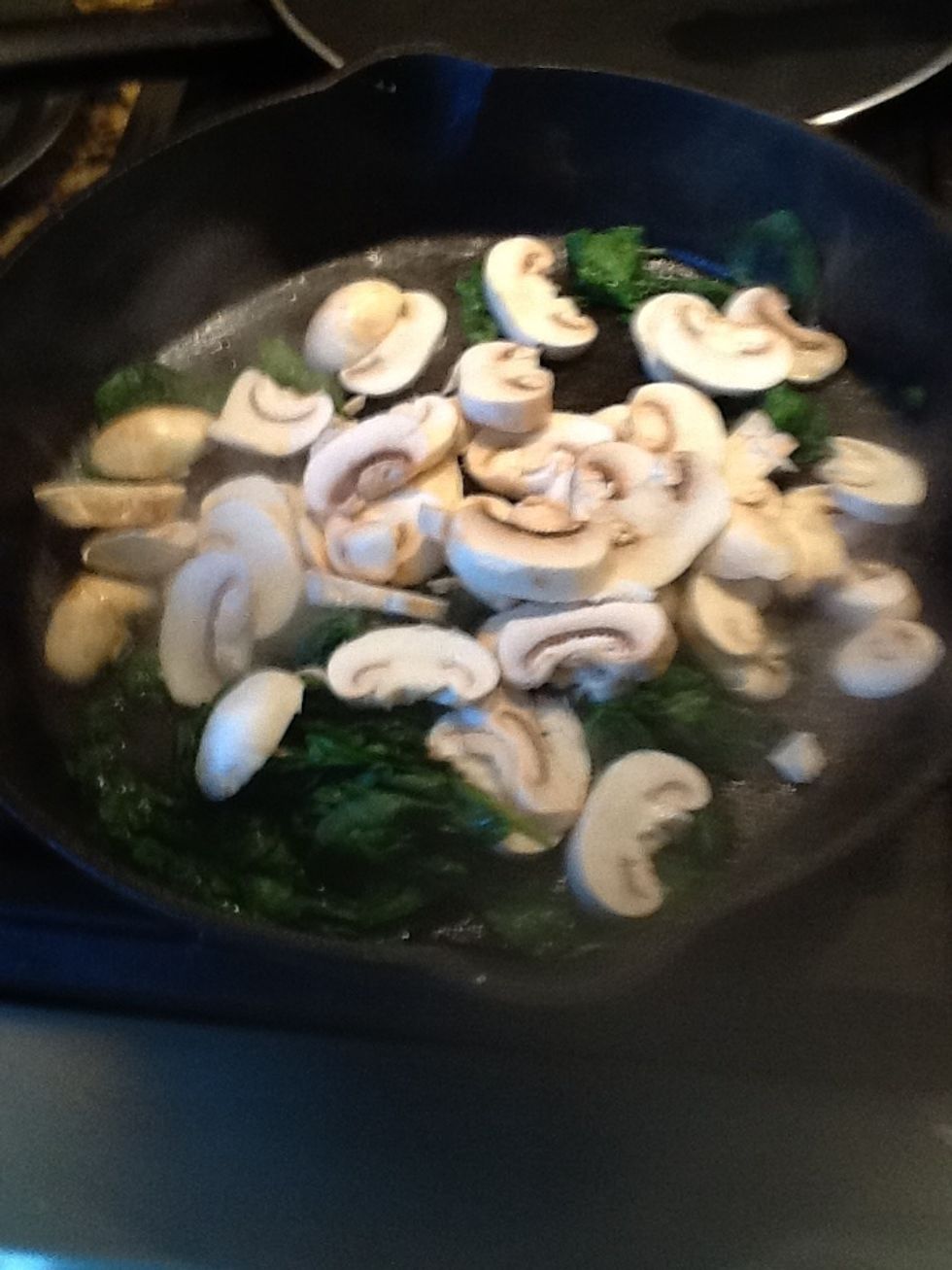 Saut\u00e9 the spinach and mushroom. You don't have to, but I do, namely to remove water