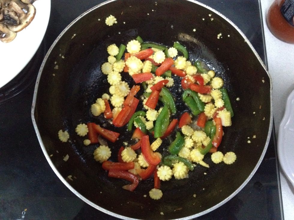 Saut\u00e9 the veg with olive oil , garlic