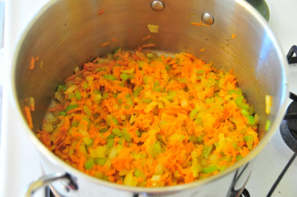 Saut\u00e9 the veggies for about 10-12 minutes over medium heat, just till the onions are a bit translucent.