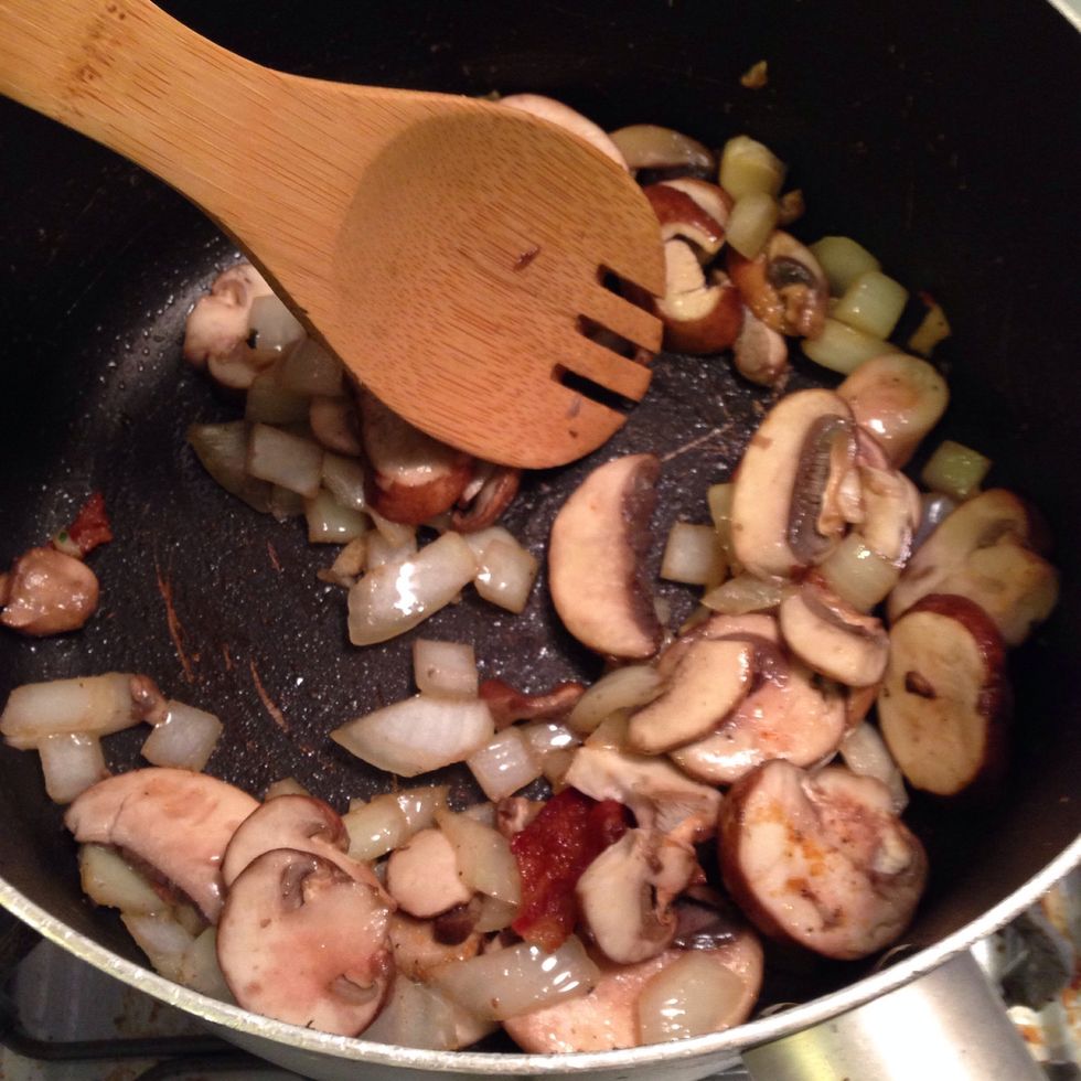 Saut\u00e9 until onions are soft and almost translucent. These are just about done. Transfer to dish set aside. we will use these later.