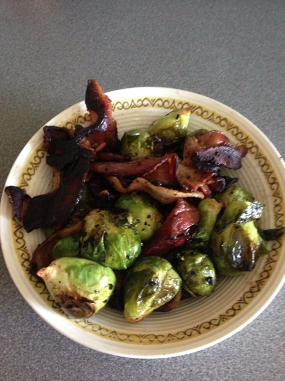 Saut\u00e9 until the outsides of the Brussels sprouts start to blacken and crisp. Remove from heat and salt and pepper to taste.