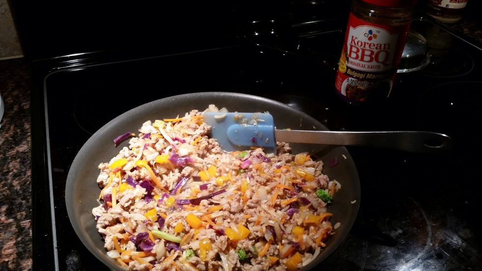 Saut\u00e9 until the veggies are all wilted, then add half a cup of your bugogi marinade sauce, keep heat on and stir to mix everything. You can try different sauces, for example hoisin sauce.