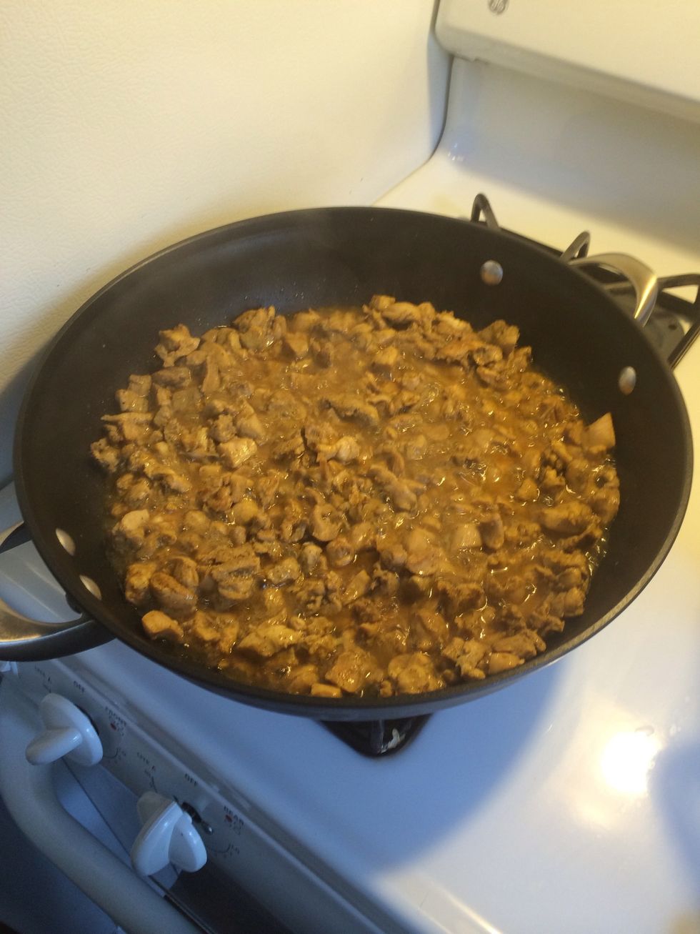 Saut\u00e9e chicken until cooked completely