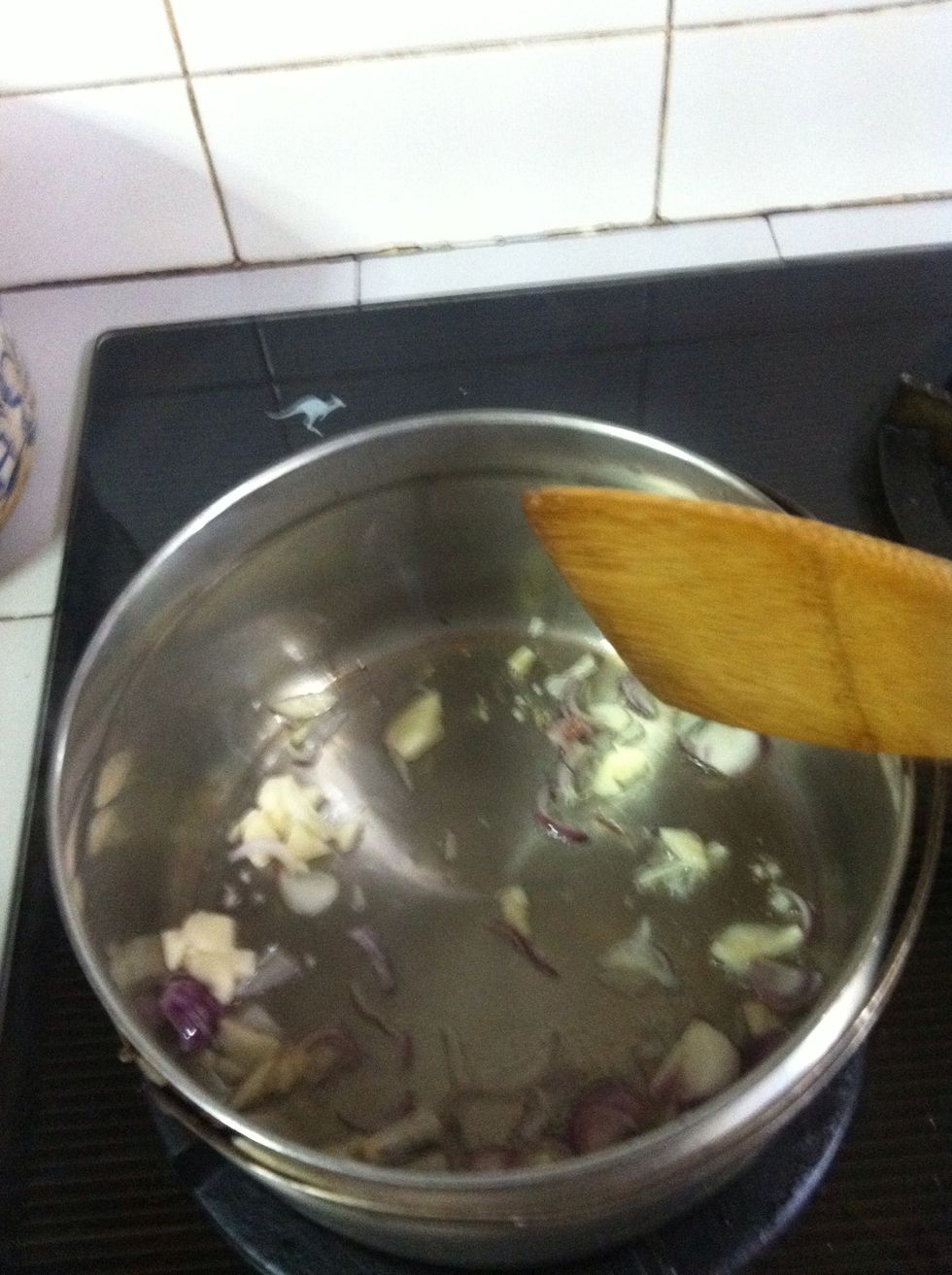 Saut\u00e9e chopped shallots and garlic