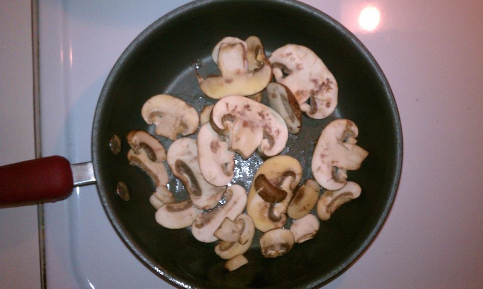 Saut\u00e9e mushrooms in olive oil until brown