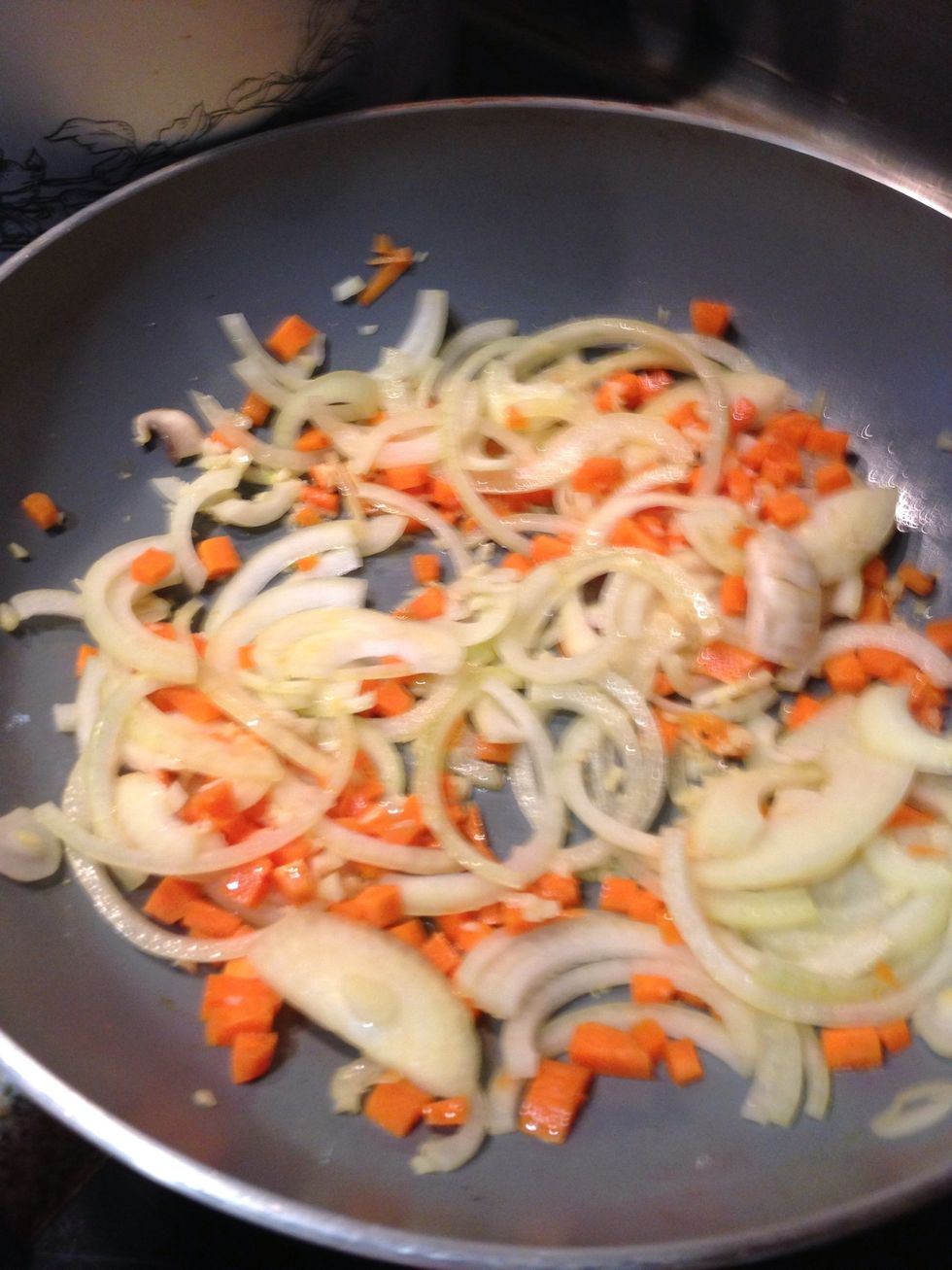 Saut\u00e9ed onion & carrot.