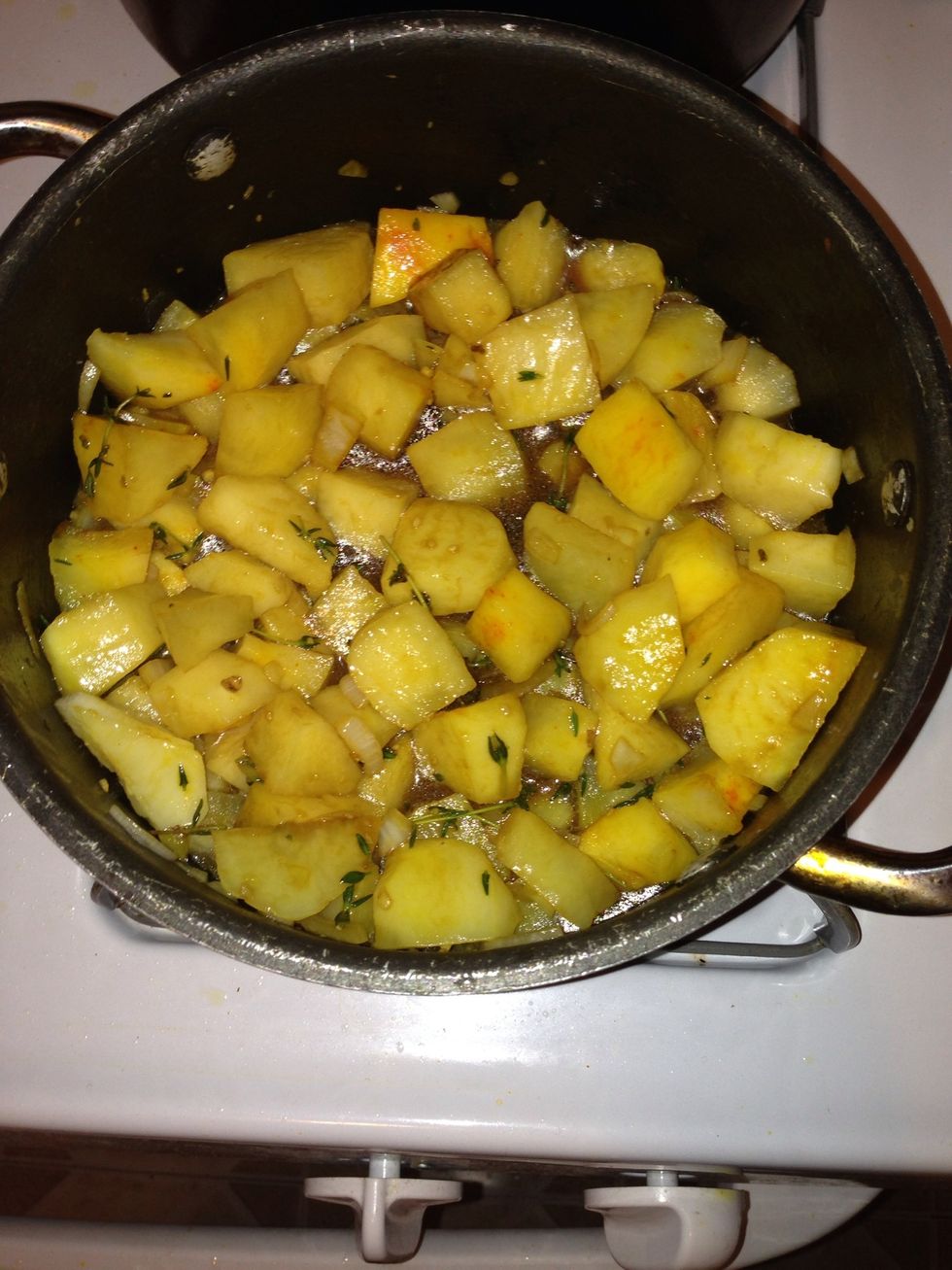 Saut\u00e9ed the potato add thyme garlic and curry season 6 teaspoon little season for about 3 min mix in the chicken
