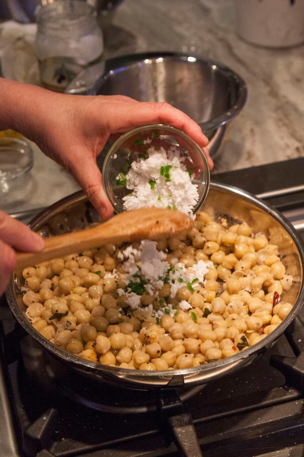 Saute everything together for about 3 minutes then take the pan off the heat. Add in the coconut...