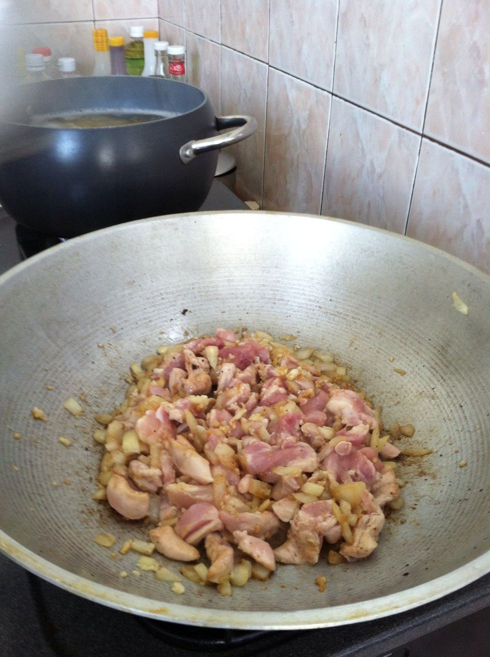 Saute garlic and onion then put the chicken cut into small pieces and let it simmer