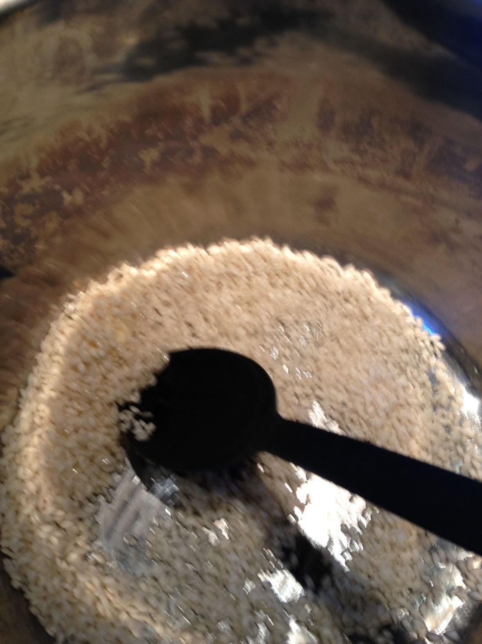 Saute the rice in the melted butter for a bit to coat evenly, careful not to brown it.