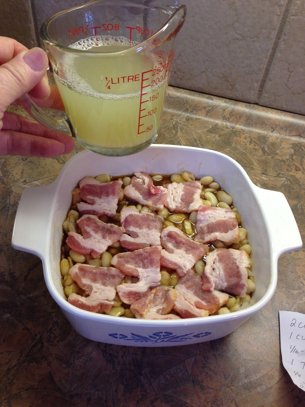 Save out a cup of liquid to add as desired during baking if they appear to be drying out. Bake  covered 3 hours @ 300\u00b0 or 2 hours at 325\u00b0. Check each hour, removing cover last 30-45 minutes to brown.