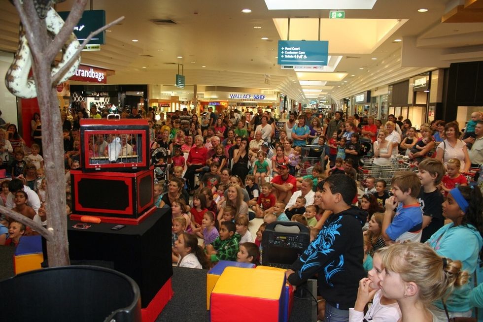 Say a large room with a large crowd. Certain magic isn't possible in certain venues. For example outside could cause props to be blown away by wind. Lighting can affect some magic.