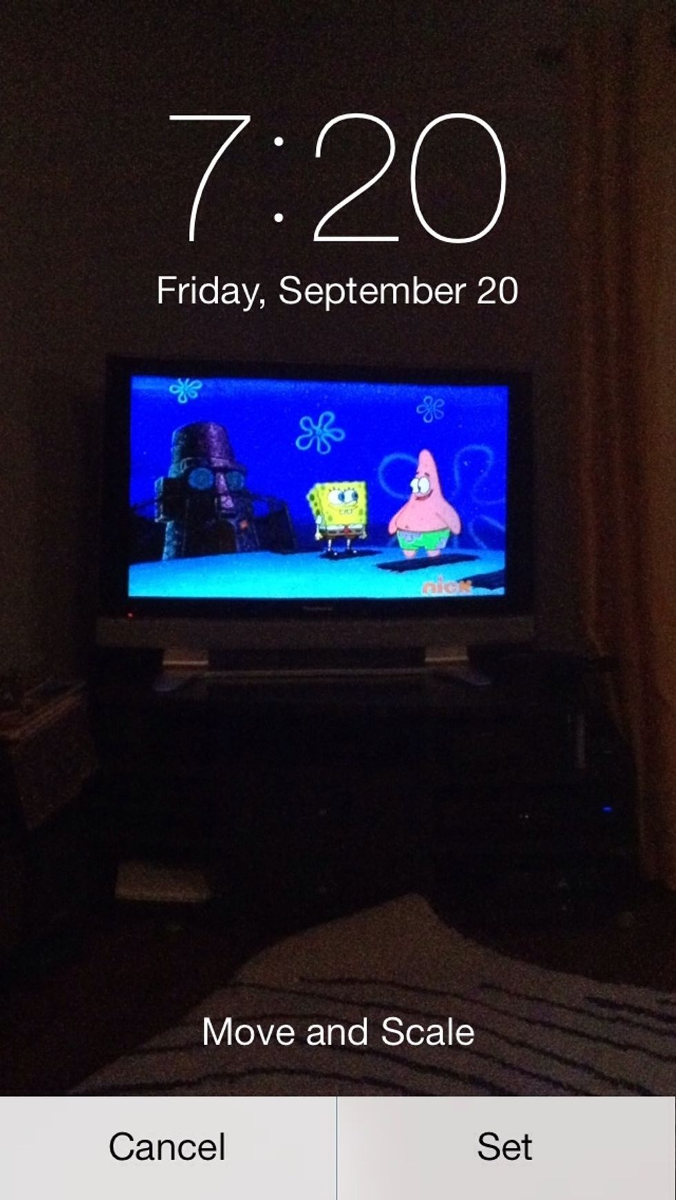 Scale it, and on your lock screen, if you move you iPhone around, the image will move!