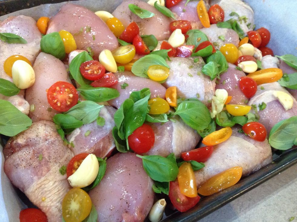 Scatter the garlic cloves into the pan