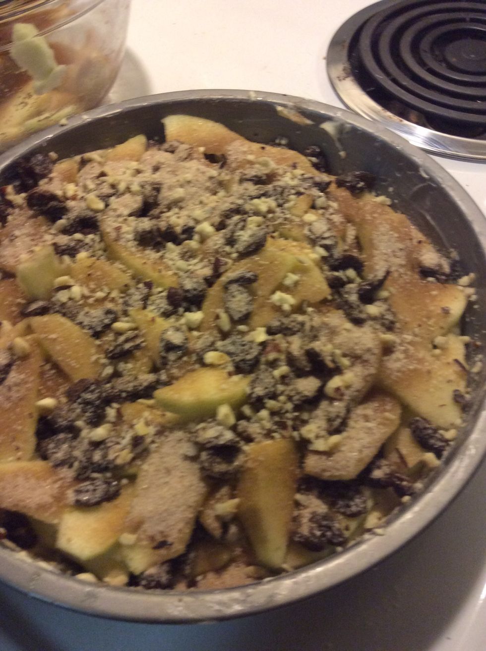 Scatter the raisins and hazelnuts on top