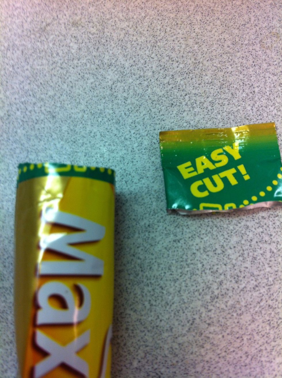 Scissors aren't necessary. These can easily be opened by hand.