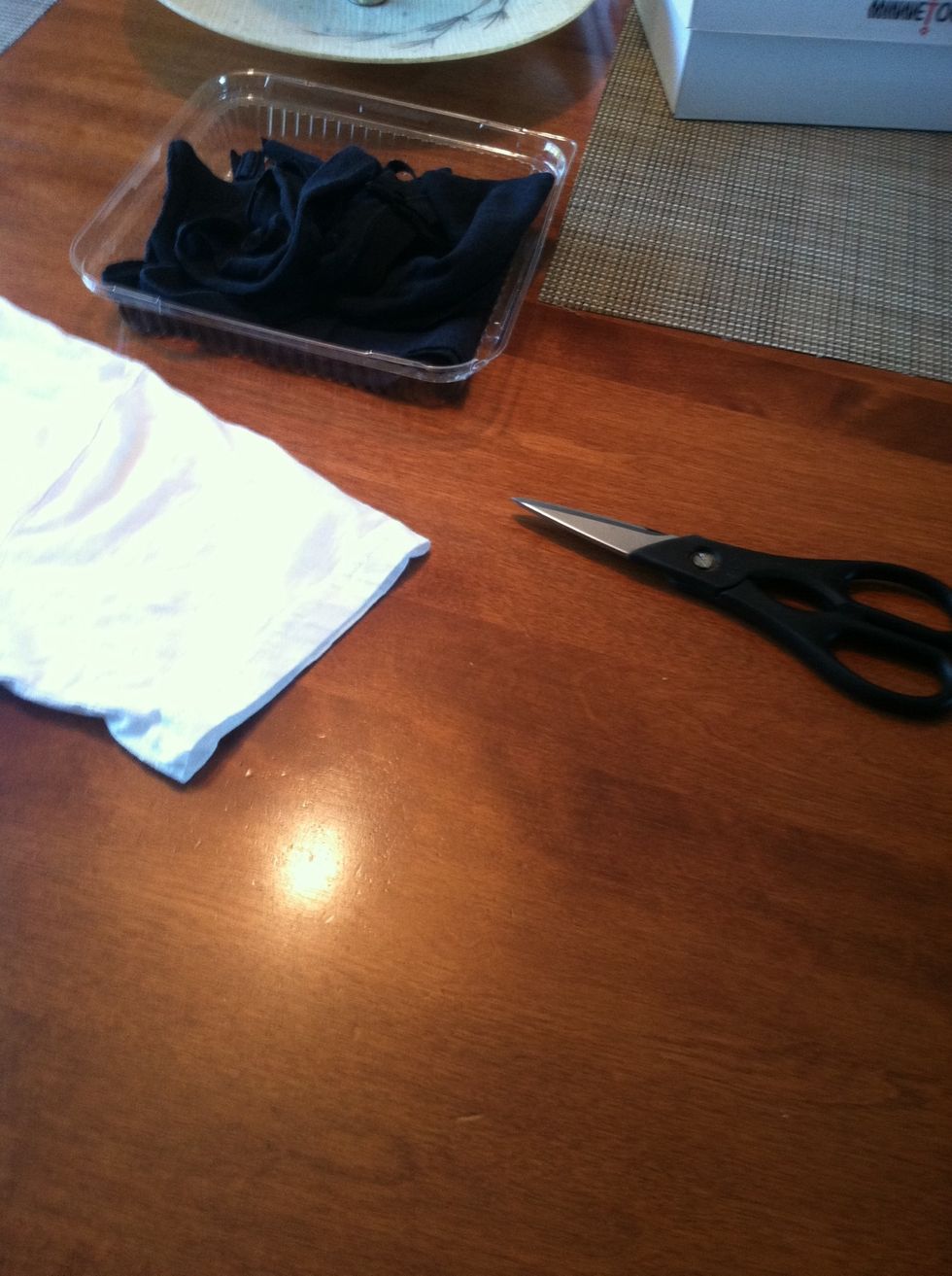 Scissors, t-shirt scrap box, old shirt.