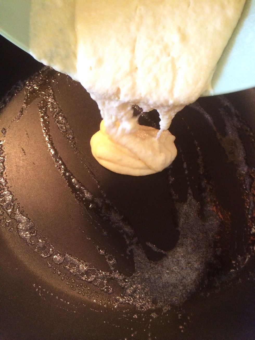 Scoop 1/4 cups worth of the batter and pour it into the pan
