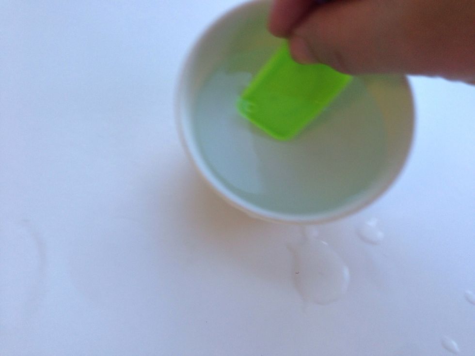 Scoop 1 Lid full of water