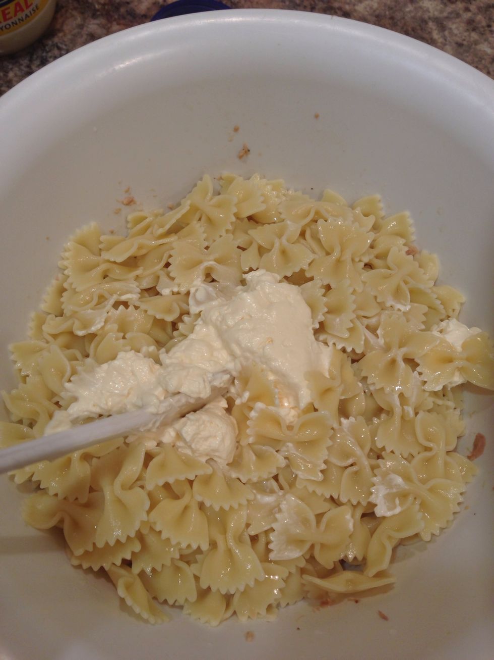 Scoop a good amount of mayonnaise onto the pasta